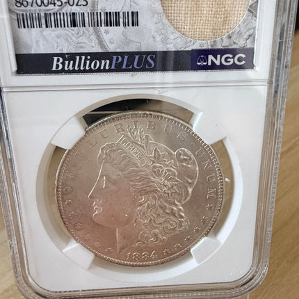 1884 O Morgan Dollar NGC Brilliant Unc Original Bag Fragment 90% Silver Genventro